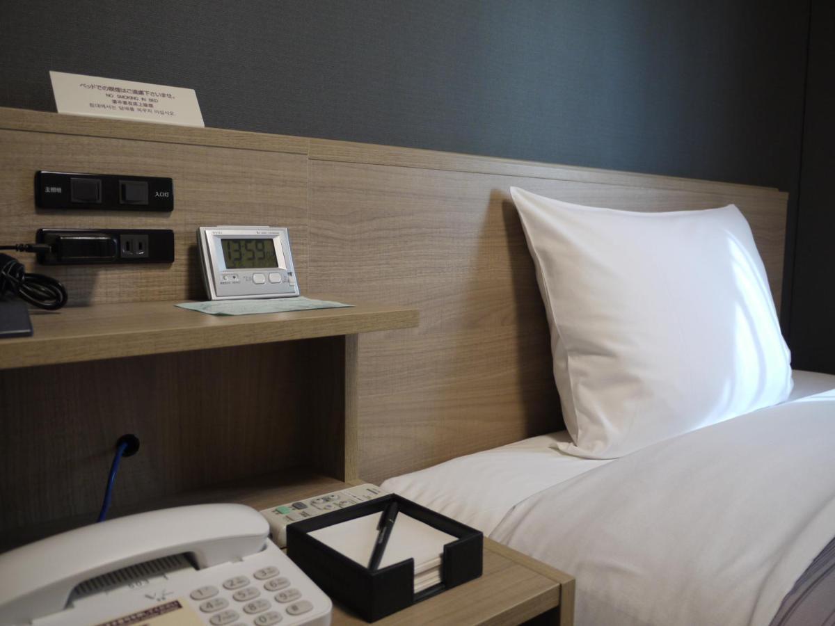Hotel Route-Inn Shinano Omachi Ekimae Екстер'єр фото